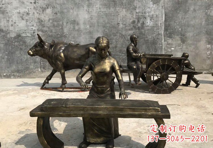 广州弹古筝的美女铜雕