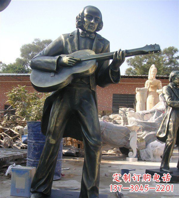 广州公园弹吉他的西方男人人物铜雕