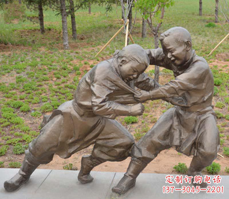 广州公园摔跤的小男孩铜雕