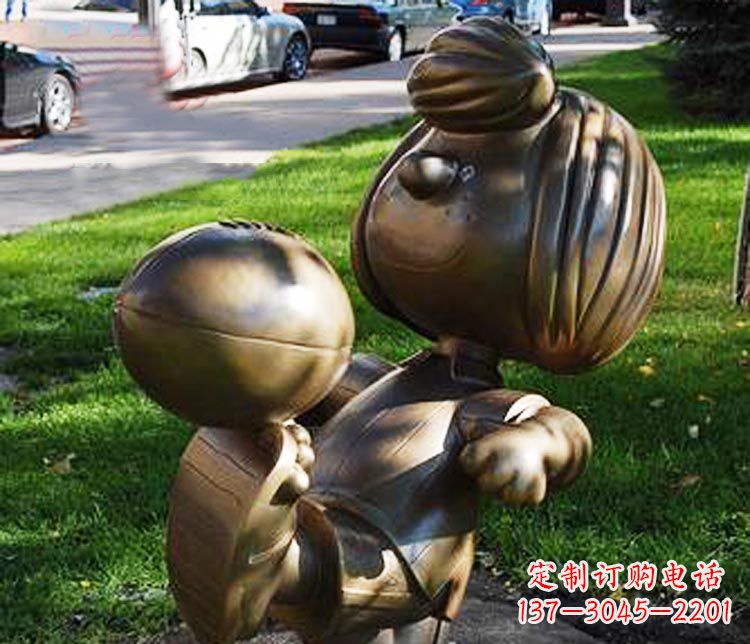 广州踢球的小女孩铜雕