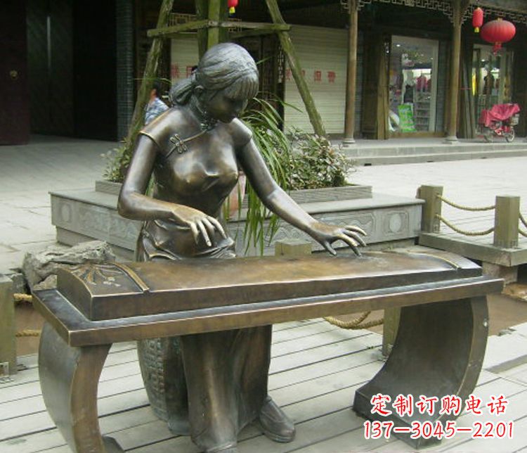 广州铜雕现代人物弹古筝雕塑