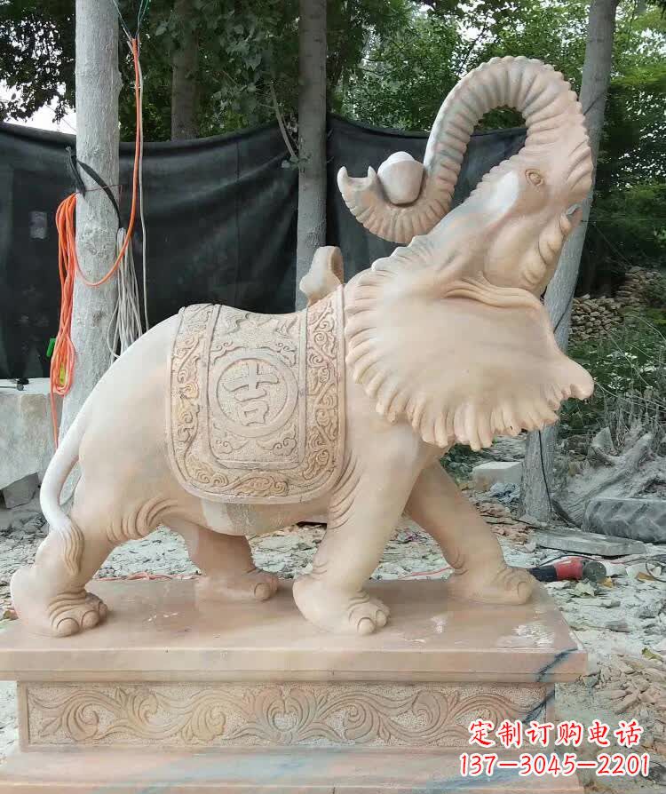 广州晚霞红卷元宝大象雕塑