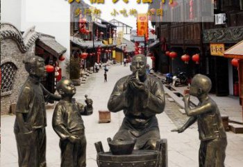 广州领雕塑：特色小品铜雕糖人