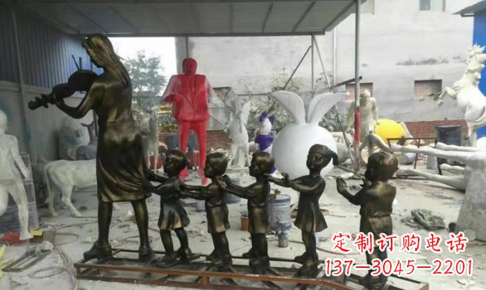 广州校园老师和儿童铜雕