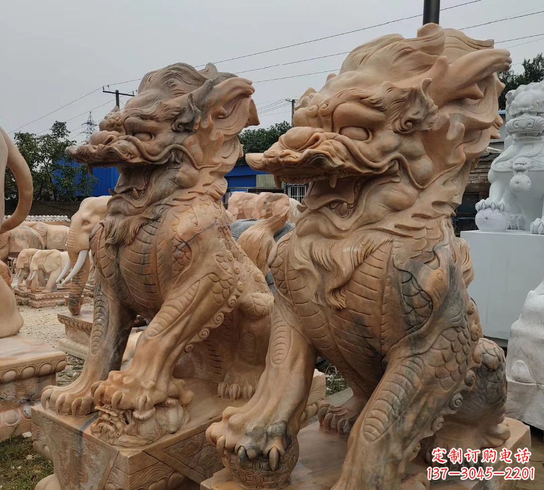 广州园林晚霞红古代招财神兽麒麟石雕