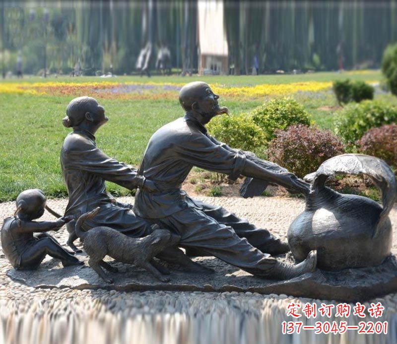 广州祖孙三人拔萝卜铜雕