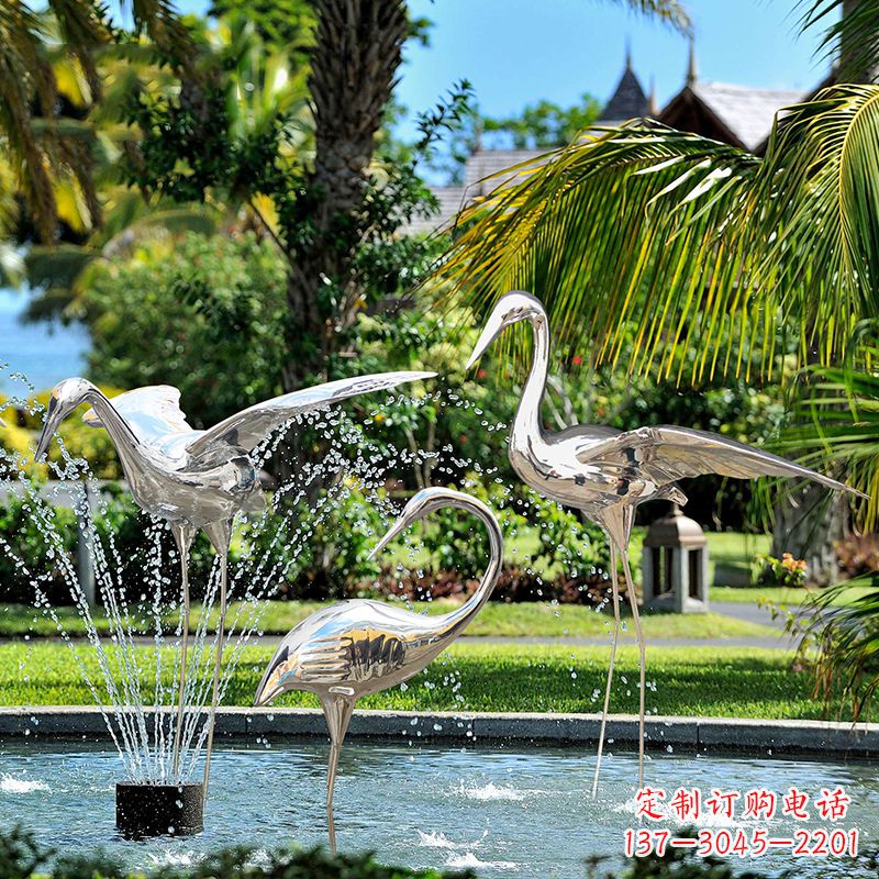 广州仙鹤雕塑-公园池塘不锈钢喷泉中的仙鹤雕塑