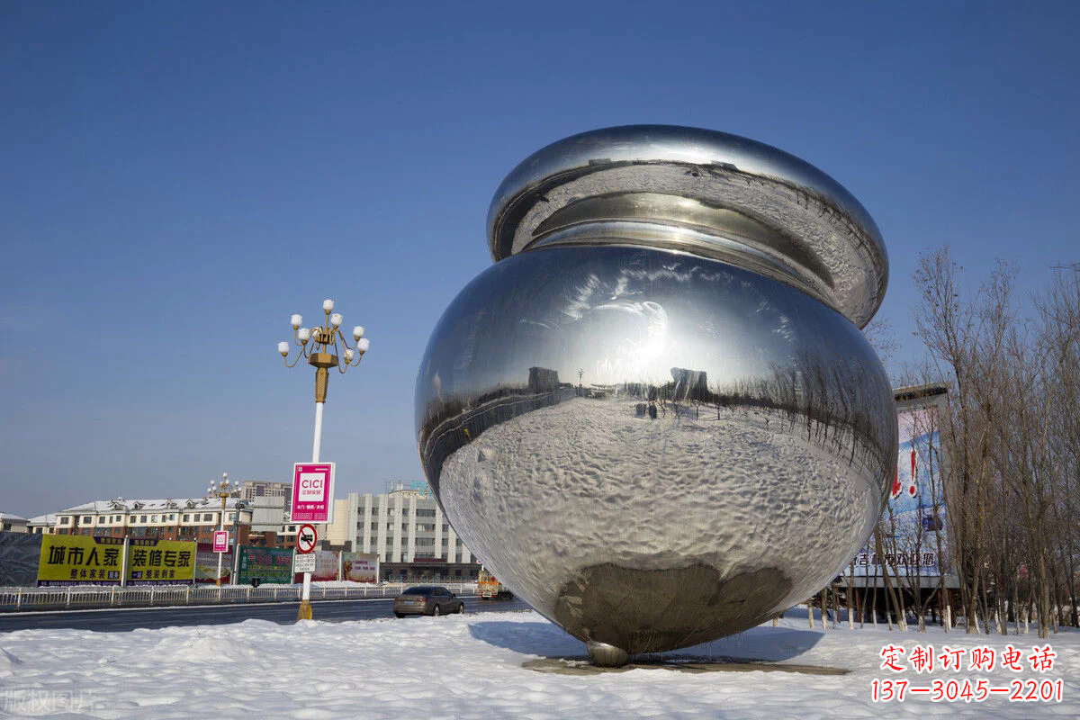 广州陀螺雕塑-户外广场大型景观不锈钢镜面陀螺雕塑