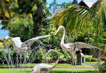 广州鹤雕塑-公园池塘不锈钢镜面抽象喷泉中的鹤雕塑